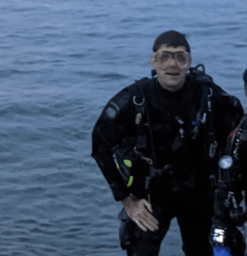 NAUI Instructor C.Gibson emerging from a dive