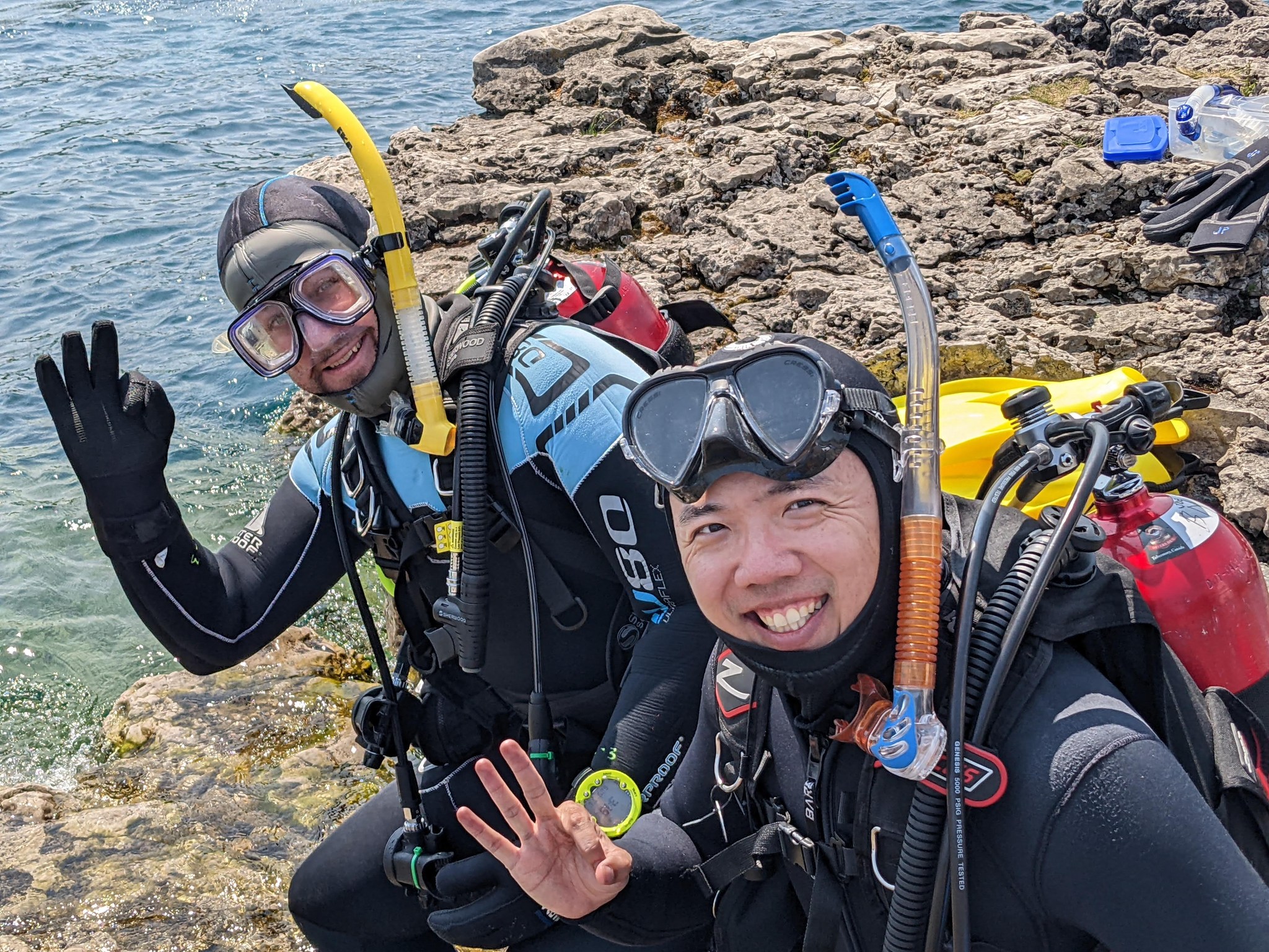 divers on shore signaling OK - with Blue North Scuba Club, Toronto