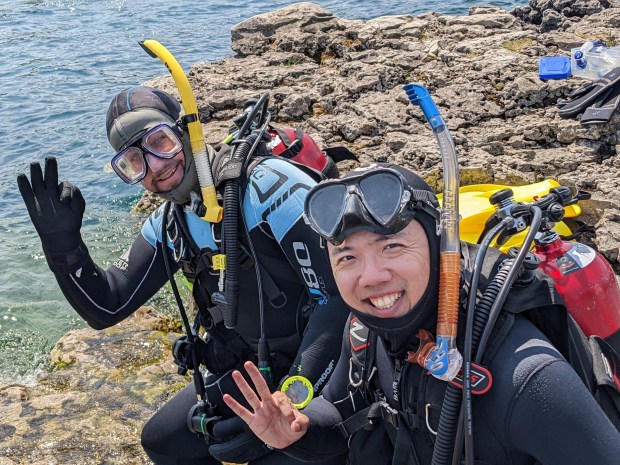 divers on shore signaling OK - with Blue North Scuba Club, Toronto